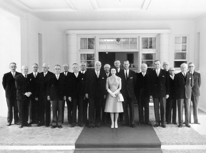 Queen Elizabeth and Prince Philip are seen here with Fadden (seventh from the left) and former PM Forde (fifth from left). Source: Getty.