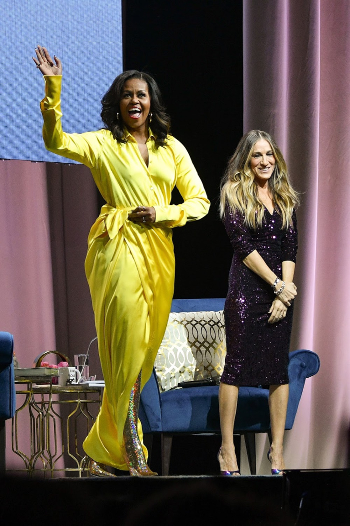 Former first lady Michelle Obama (L) discussed her book "Becoming" with actress Sarah Jessica Parker at Barclays Center. 