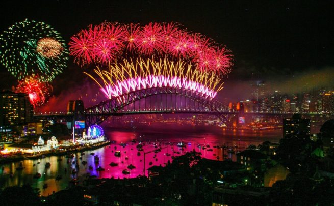 Fireworks explode over the Sydney Harbour Bridge during the midnight display on New Year's Eve on Sydney Harbour. 