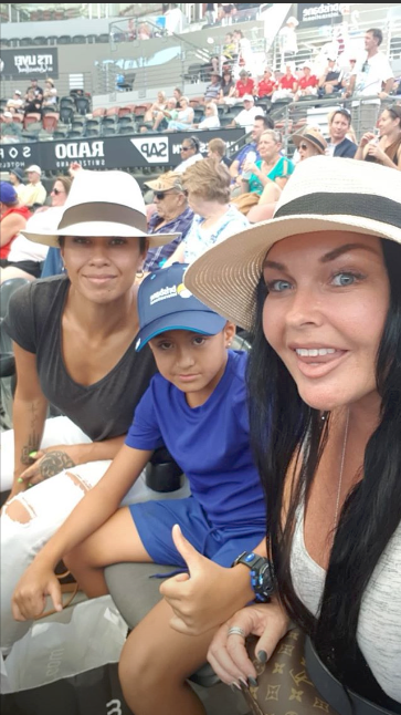 Schapelle Corby takes a selfie with two other's at Brisbane International. 