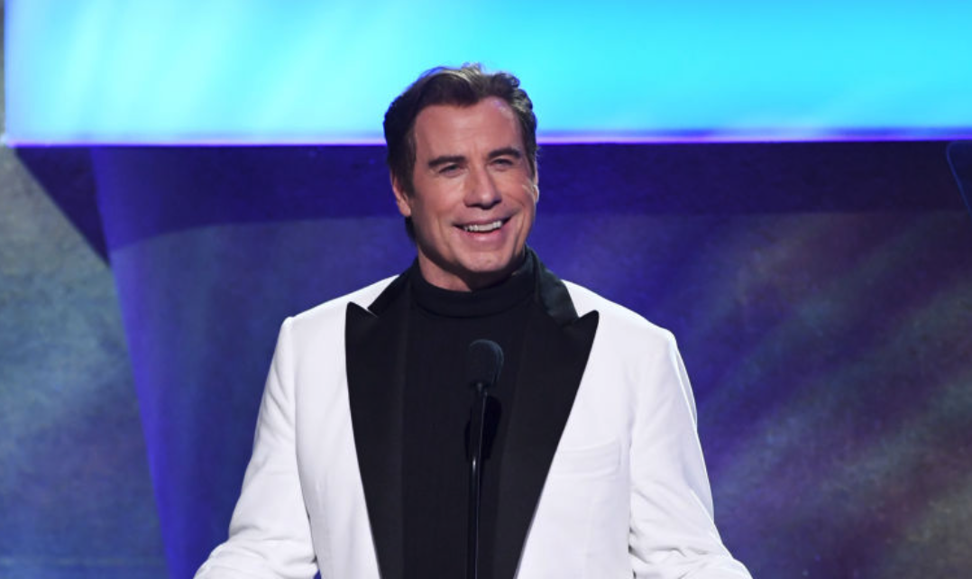 John Travolta is often seen with much thicker hair. Source: Getty.