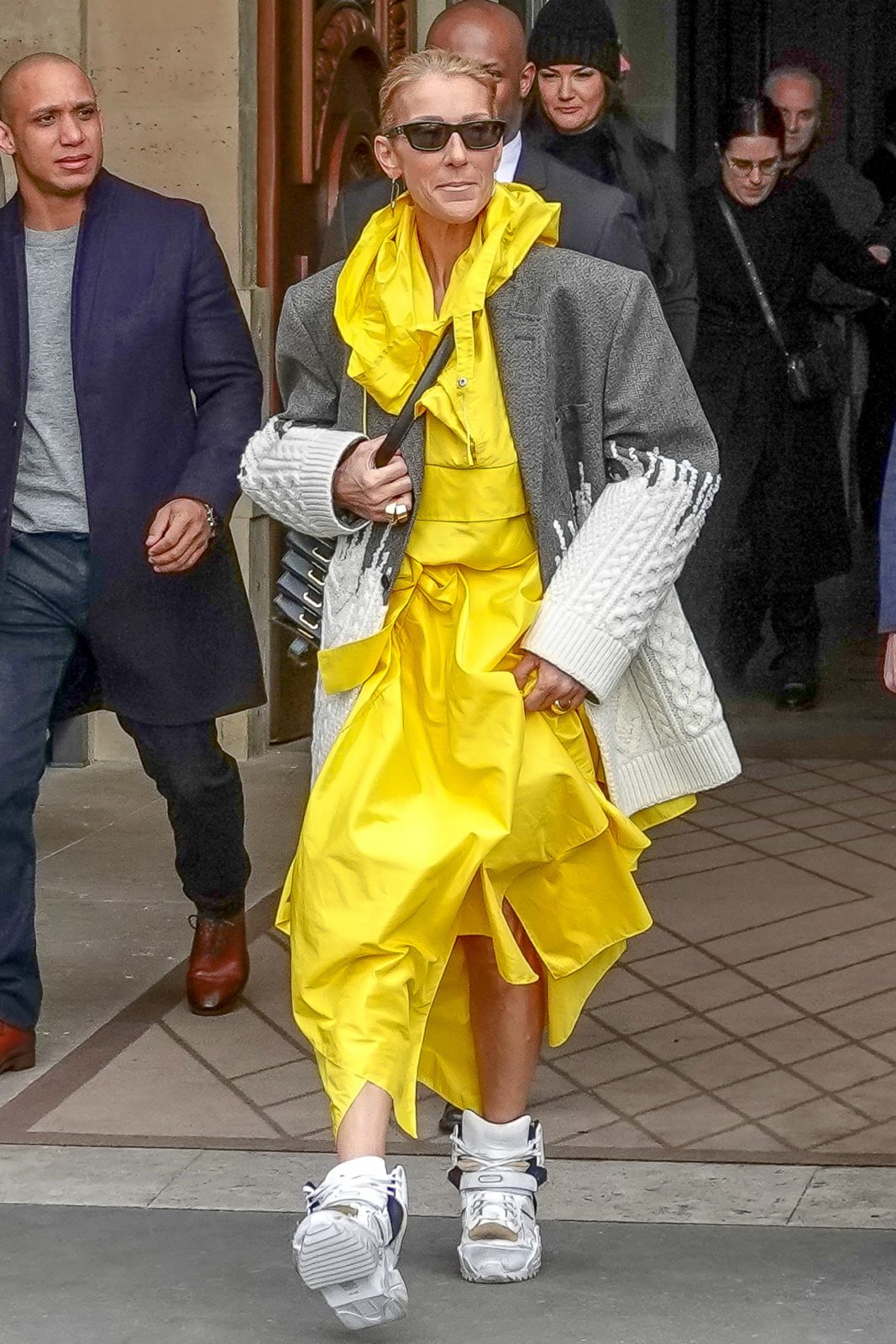 Celine Dion was spotted in Paris sporting an eye-popping yellow ensemble.