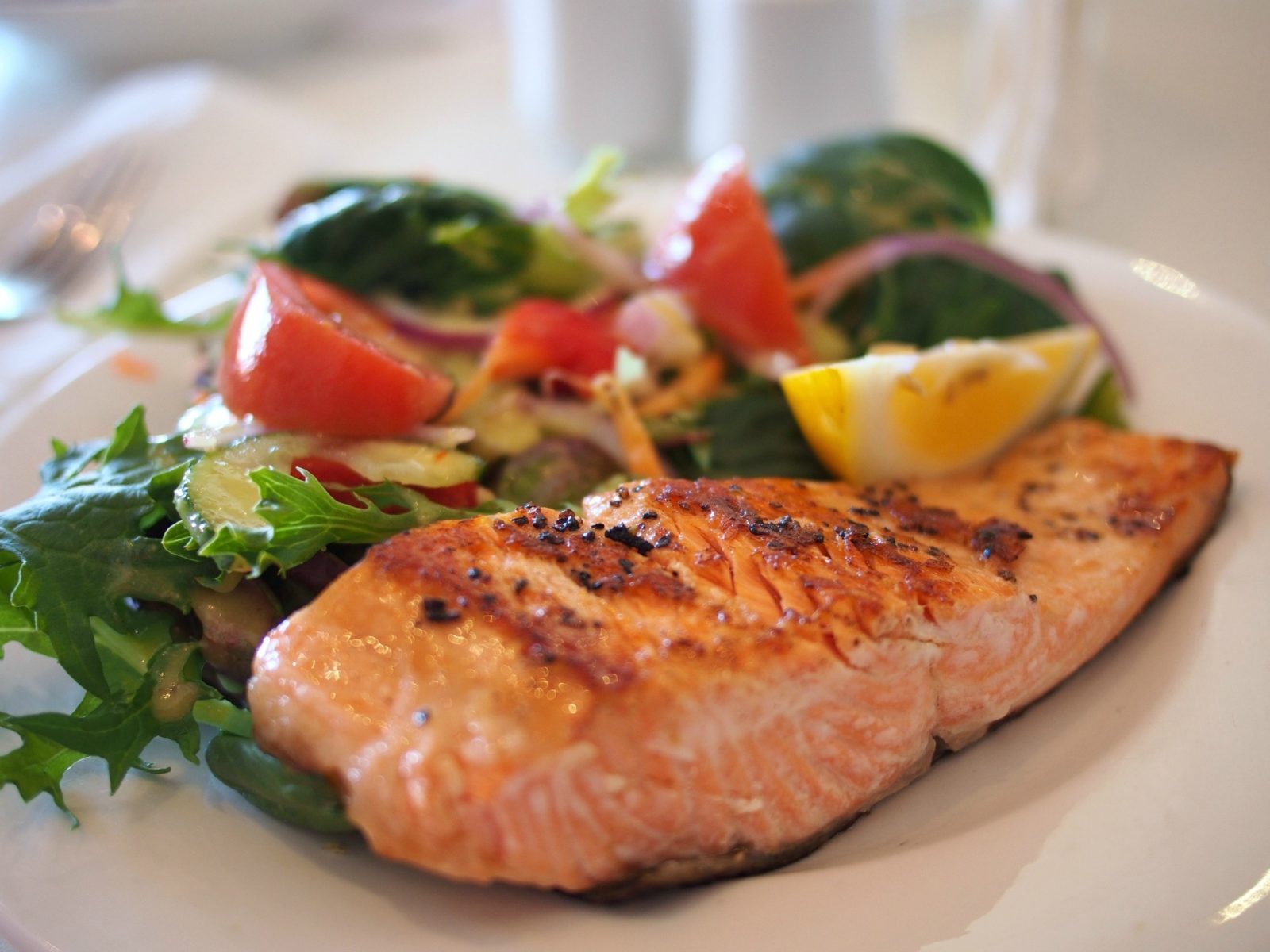 Foods such as salmon are are rich in omega 3 acid and fatty acids, which may reduce pain and inflammation.