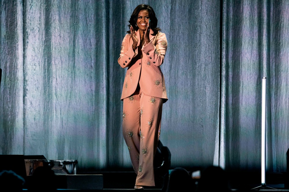 The former first lady looked amazing in salmon pink. Source: Getty.